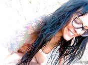 Une belle femme  lunettes et  gros seins dans un porno