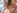 Une belle femme  lunettes et  gros seins dans un porno