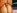 Une brune aux seins silicons se fait juter dans la bouche