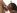 Une belle black recrut�e sur la plage et asperg�e de sperme
